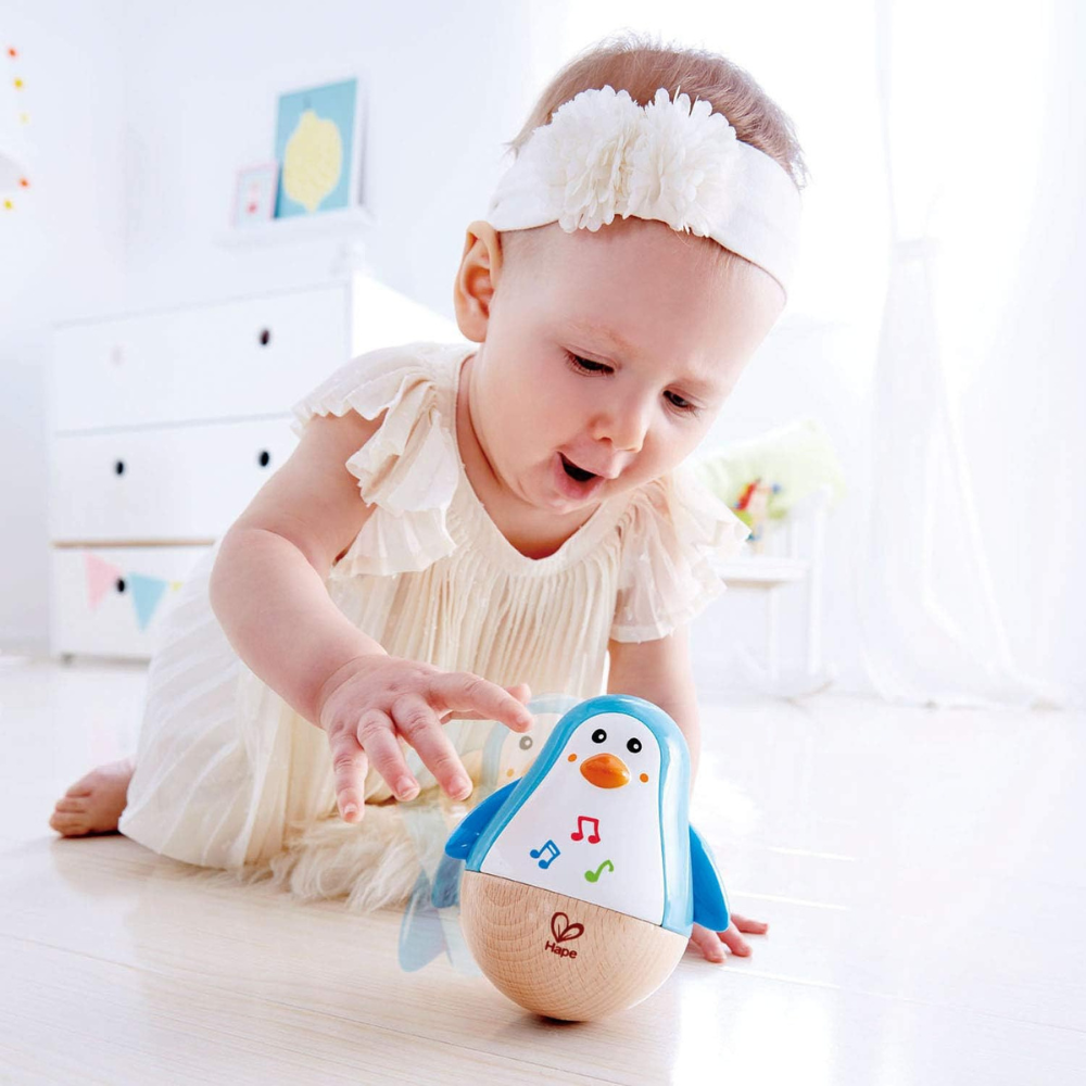 Pingouin Culbuto Musical Hape: Jouet d'Éveil Sensoriel Bébé dès 6 Mois