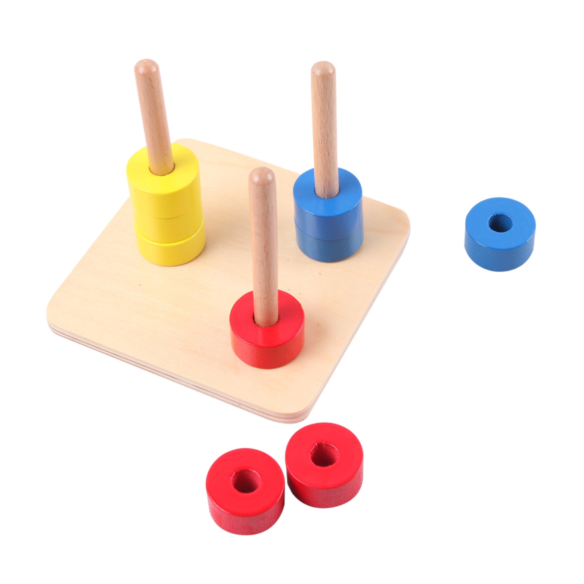 Gros plan sur les disques de différentes tailles et couleurs du jouet Montessori