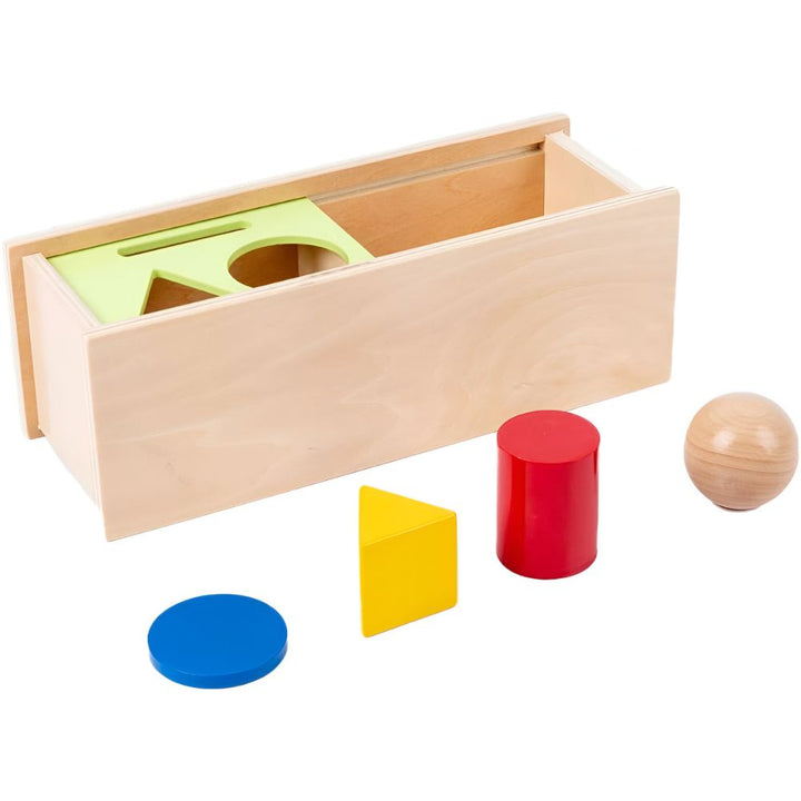 Gros plan sur les formes géométriques (boule, cylindre, disque, prisme) pour la boîte d'encastrement