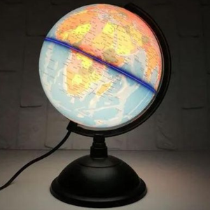 Gros plan sur la cartographie d'un continent sur le globe lumineux