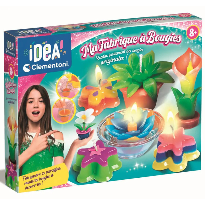 Enfant versant de la cire fondue dans un moule du kit Ma fabrique à bougies
