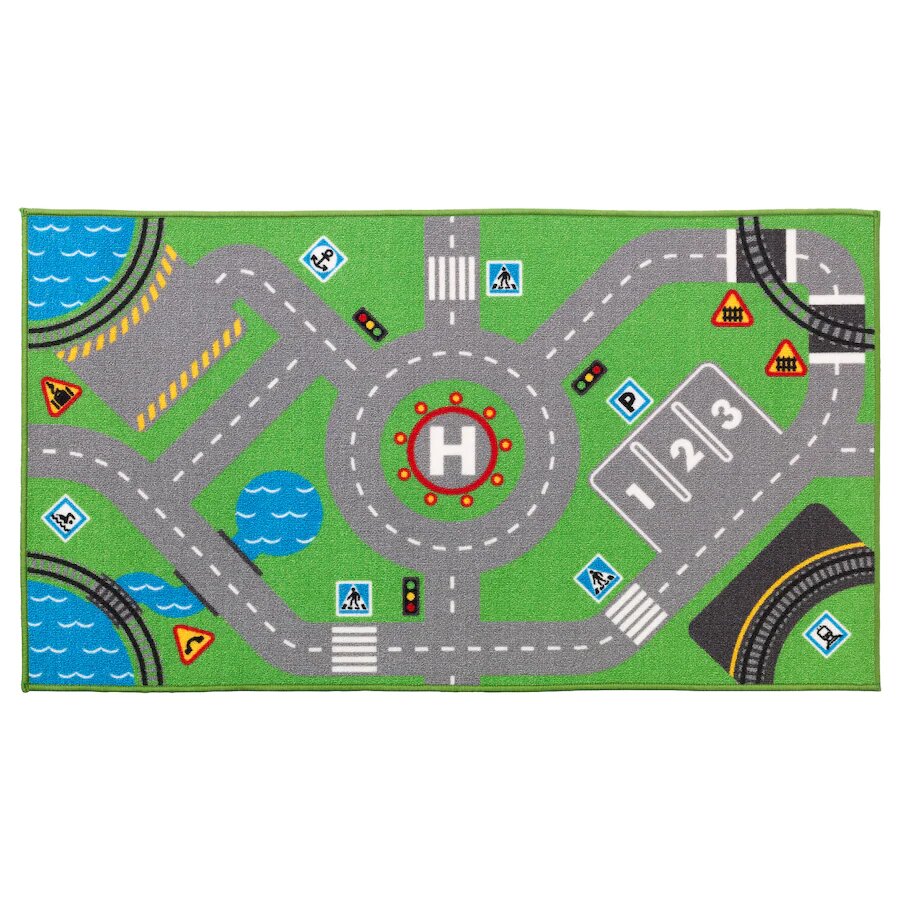 Tapis éducatif circulation routière en action, enfants jouant avec des véhicules